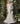 Plunging neck backless bridal gown Jovani 02859