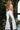 Off white fit and flare pants and beaded top