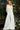 Feather bodice white jumpsuit Jovani bridal 1542